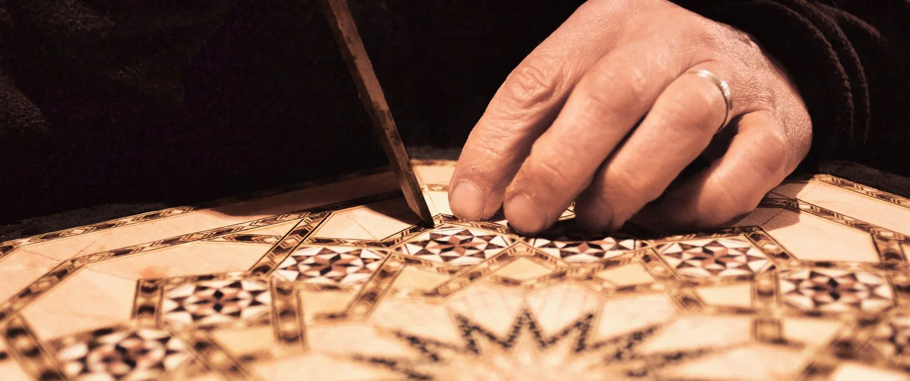 Traditional Islamic geometric marquetry pattern — hand-cut veneer inlay