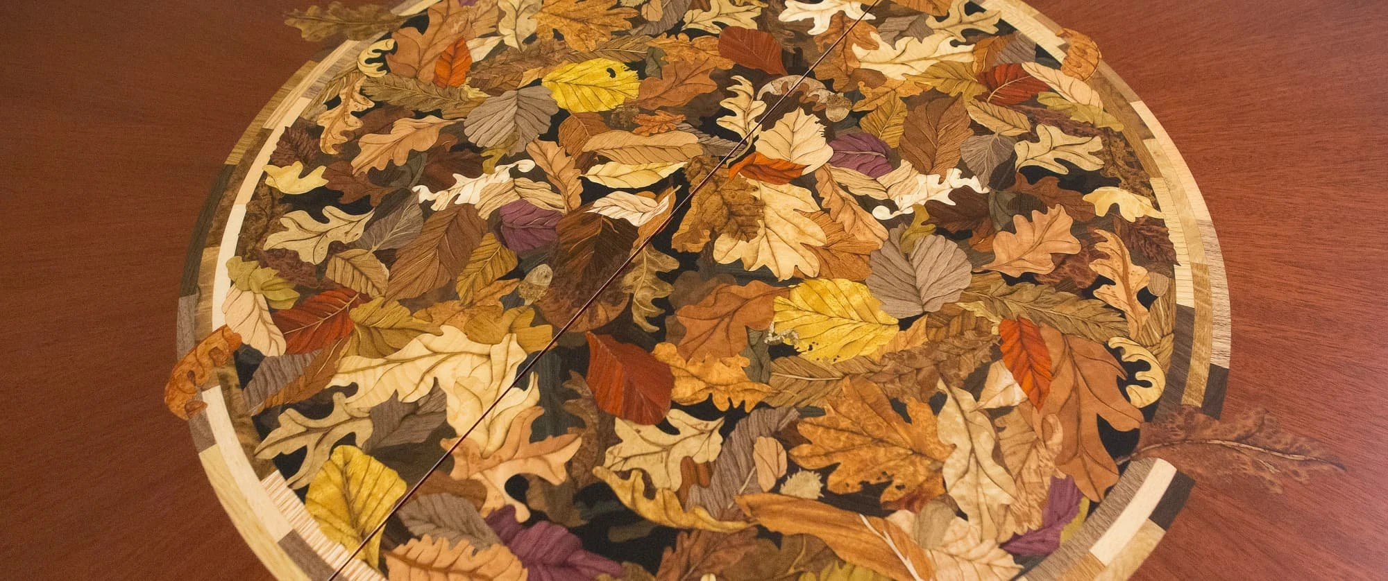 Bespoke marquetry panel in wood veneer and mother of pearl