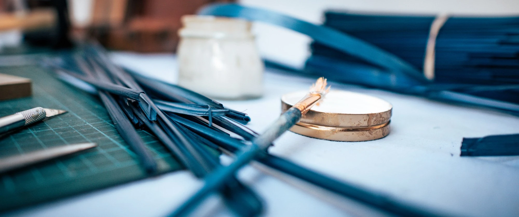 Straw Marquetry Artist At Work with Brush & Glue