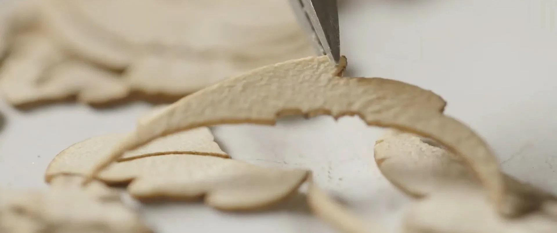 Sand shading — placing veneer into heated sand