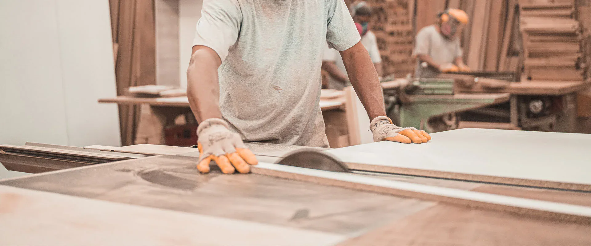 Workers sawing