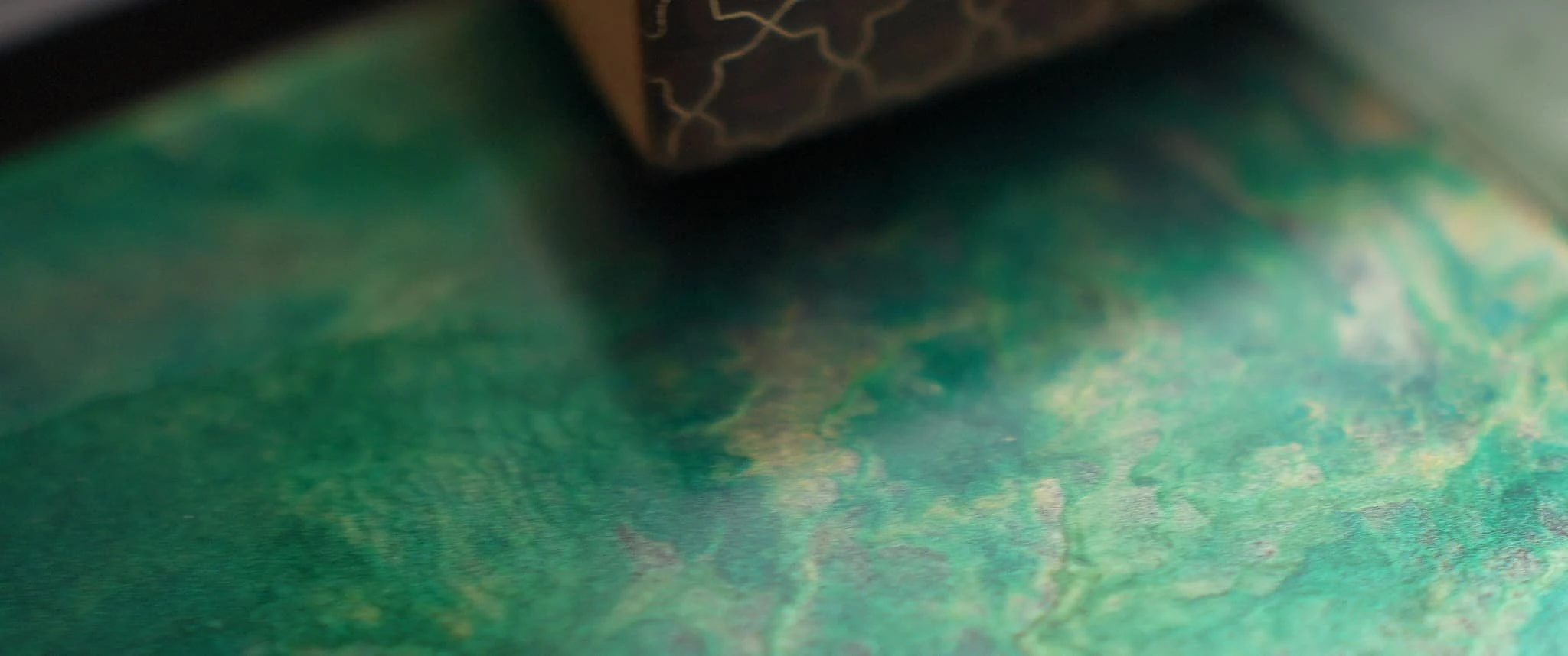Textured green lacquer finish
