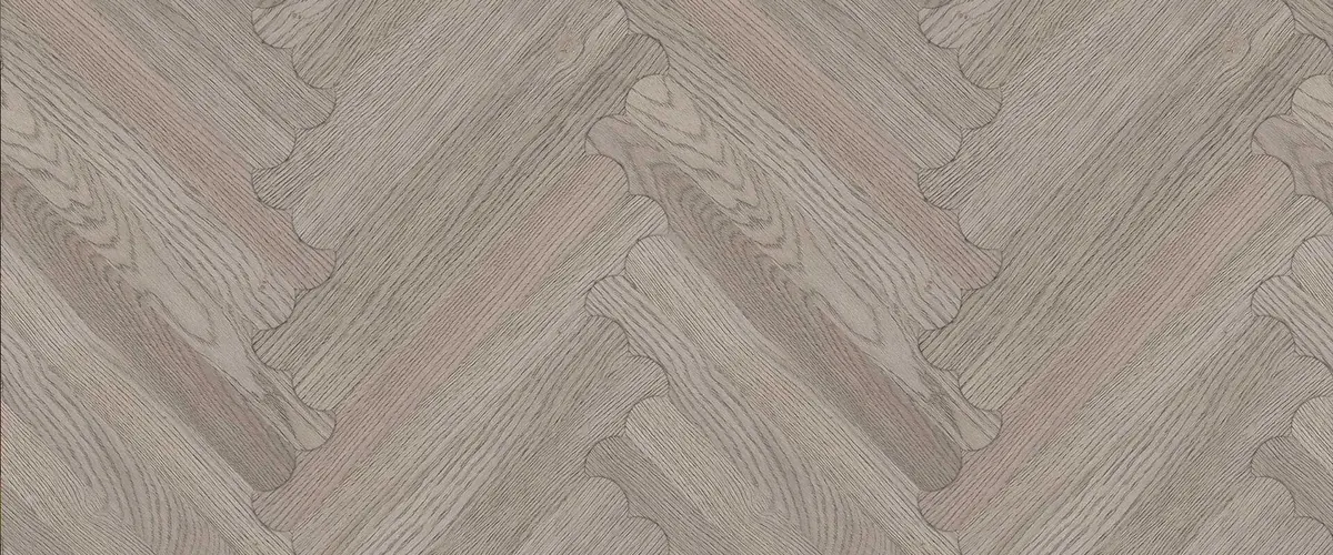 Biscuit grey oak herringbone flooring with rounded plank ends