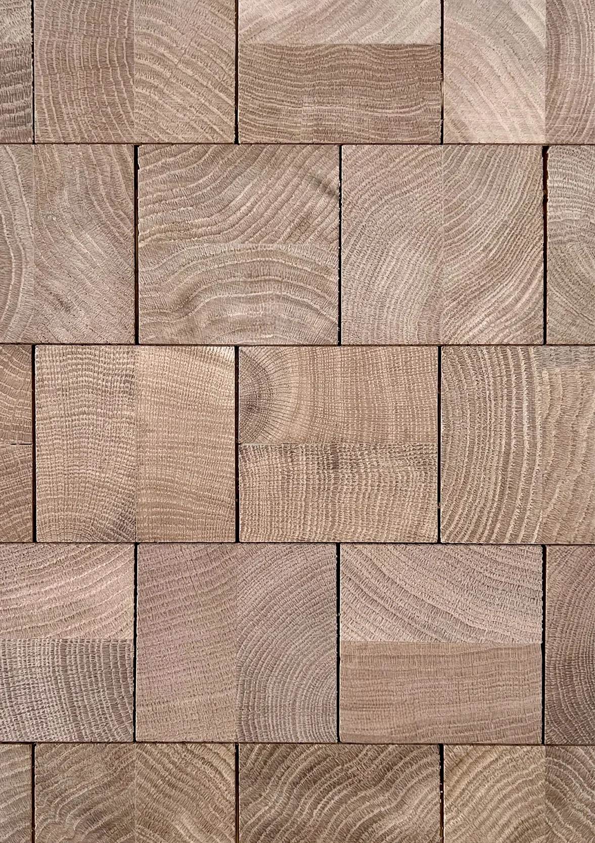 Cube natural end-grain oak blocks in an even grid, pale and warm