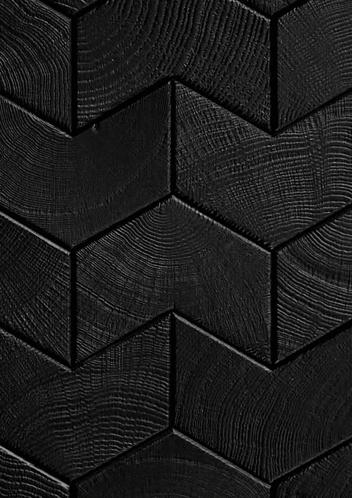 Élément black end-grain oak chevron surface with a deeply textured, charred finish