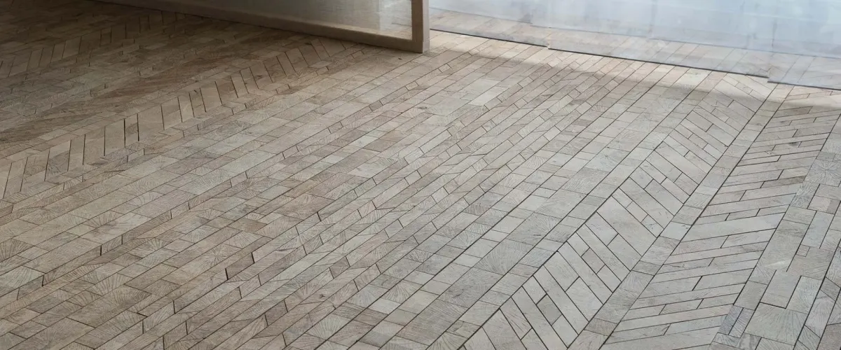 Bespoke wood flooring in end-grain oak blocks laid in herringbone and brick patterns