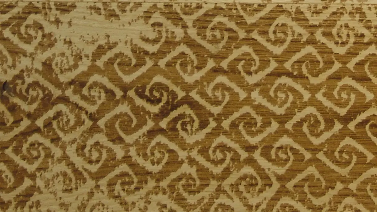 Undici golden oak flooring with a scrolled spiral pattern worked into the surface