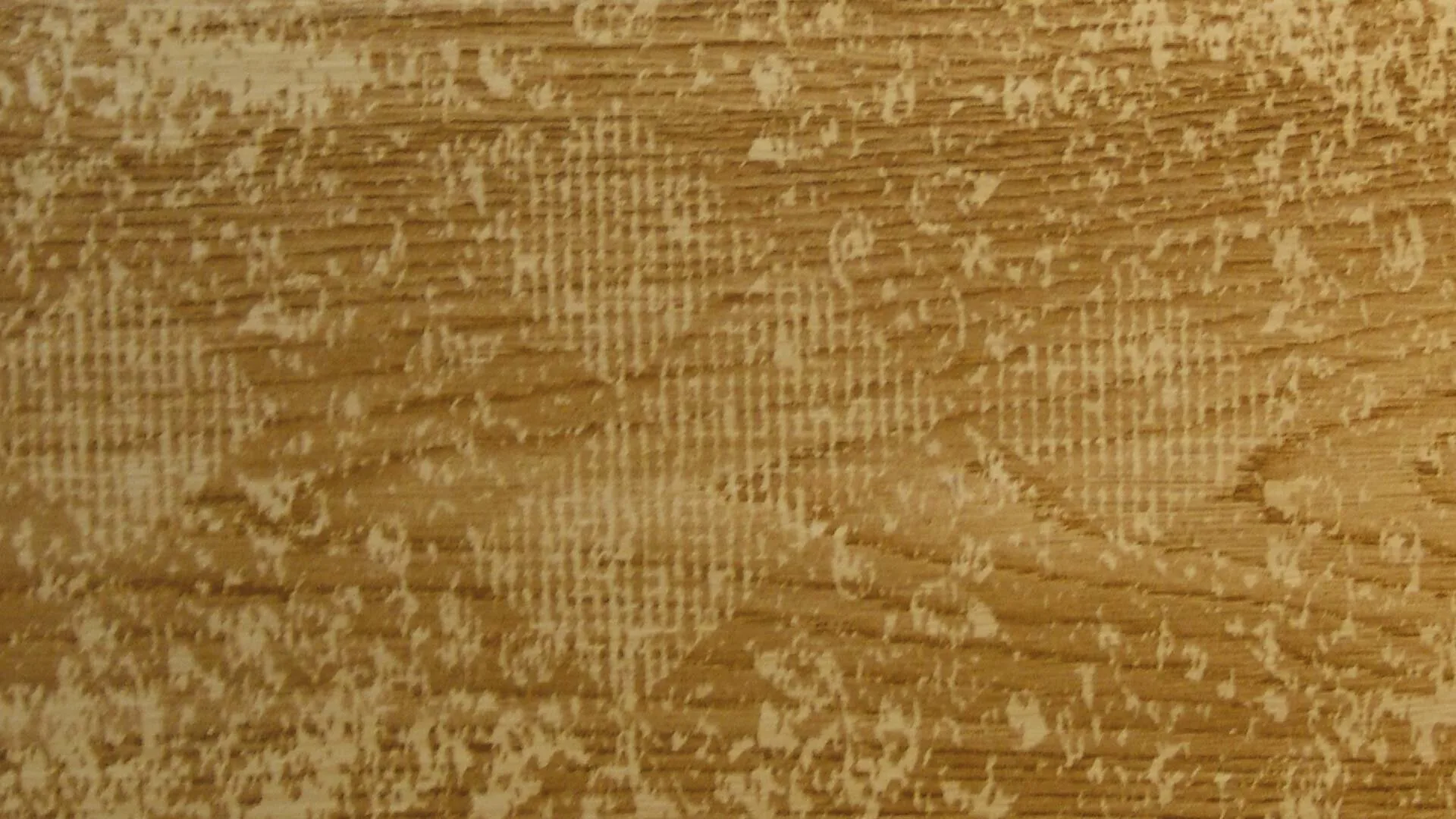 Undici oak flooring with a soft, faded engraved pattern in warm amber
