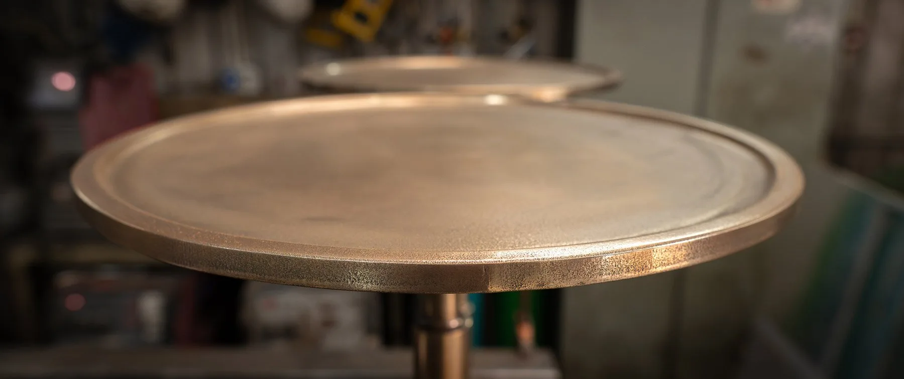 Bespoke brass side table at Julie's Restaurant — Make Bespoke Studio