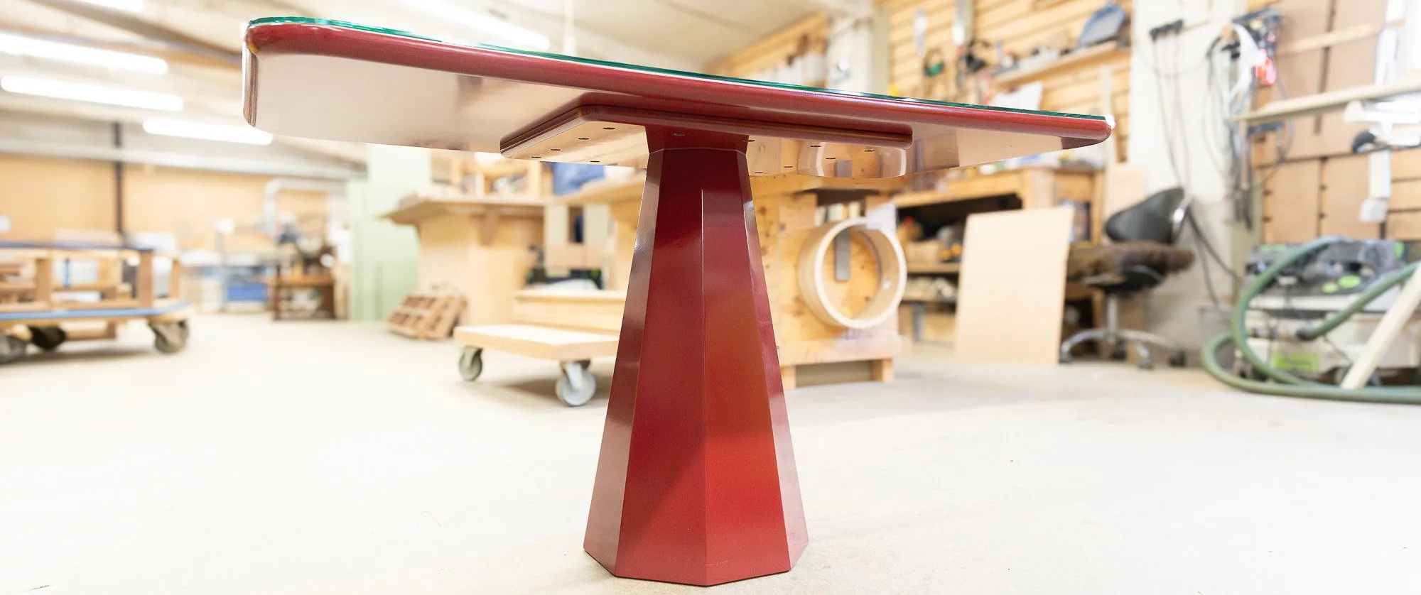 Red lacquer dining table — Make Bespoke Studio for Julie's Restaurant