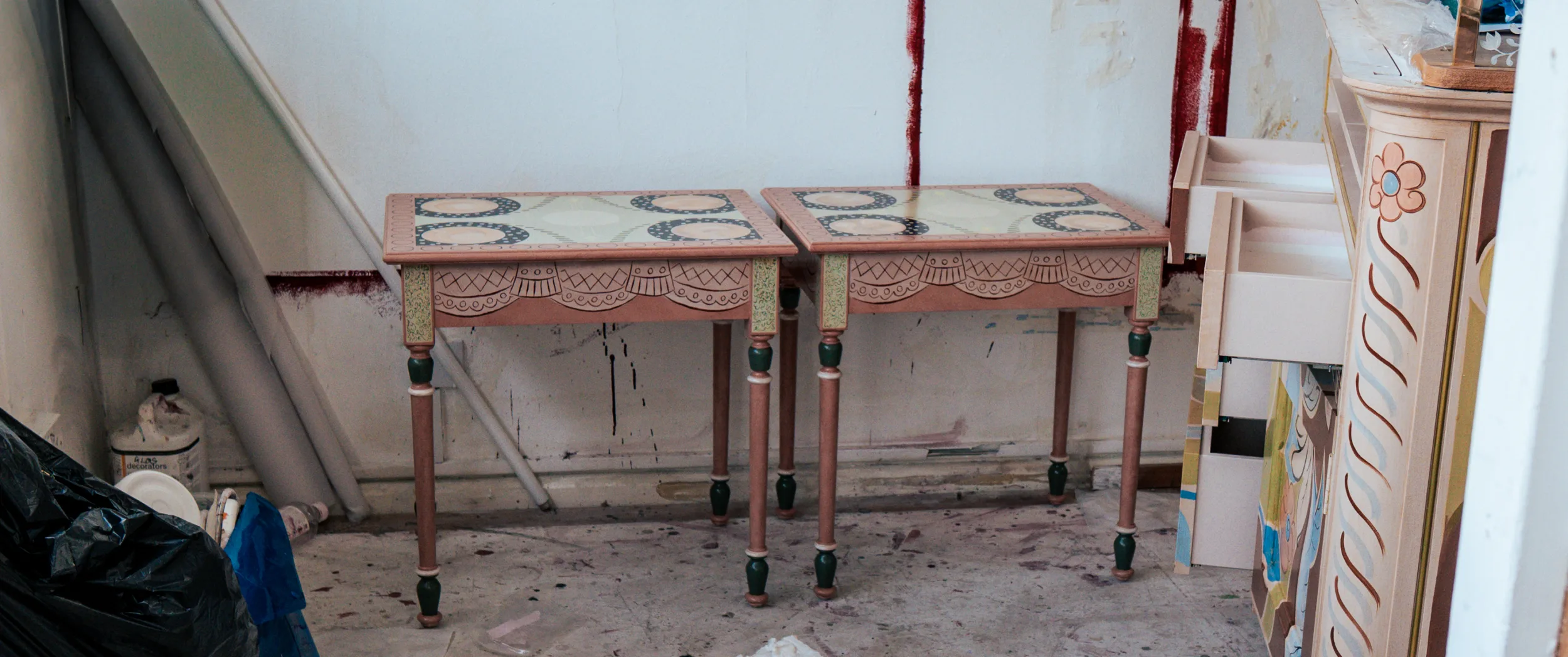 The matched pair of tables, painted, in the studio.