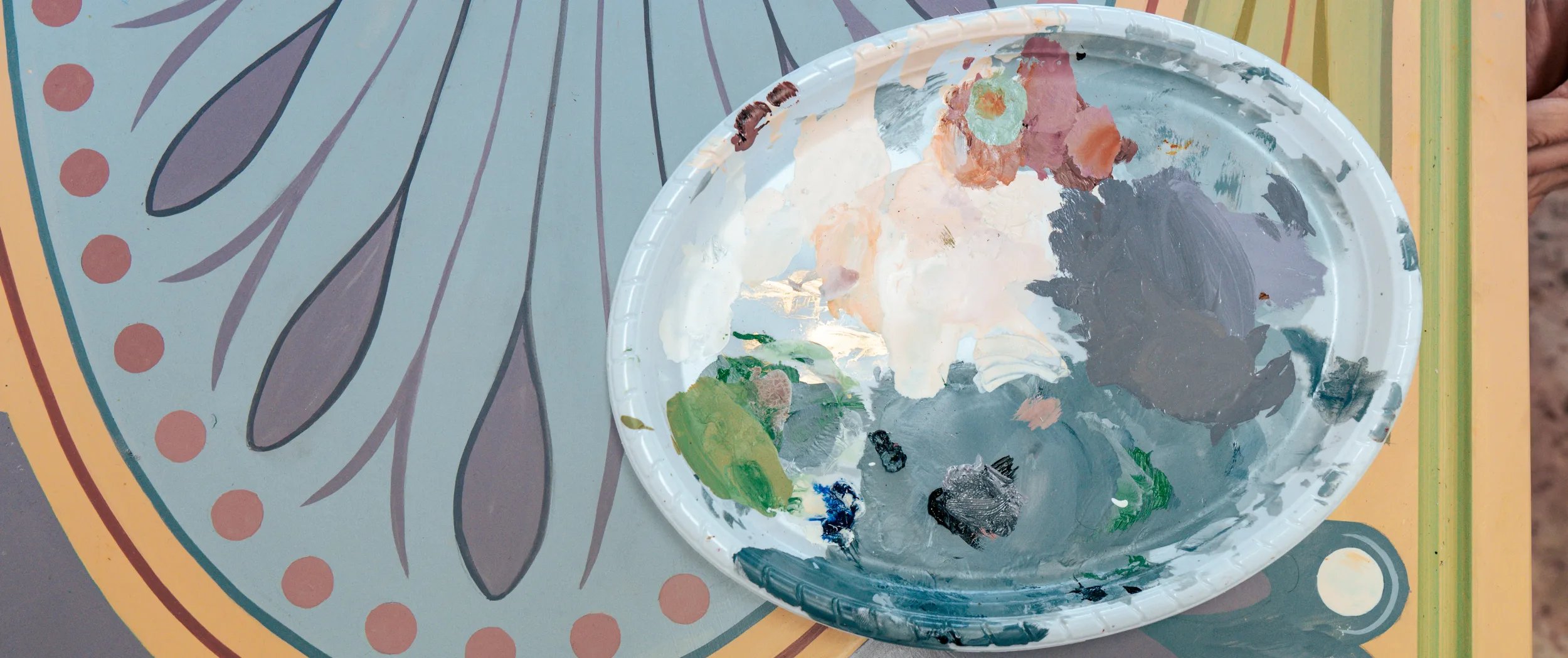 The artist's palette of oils resting on the finished painted top.