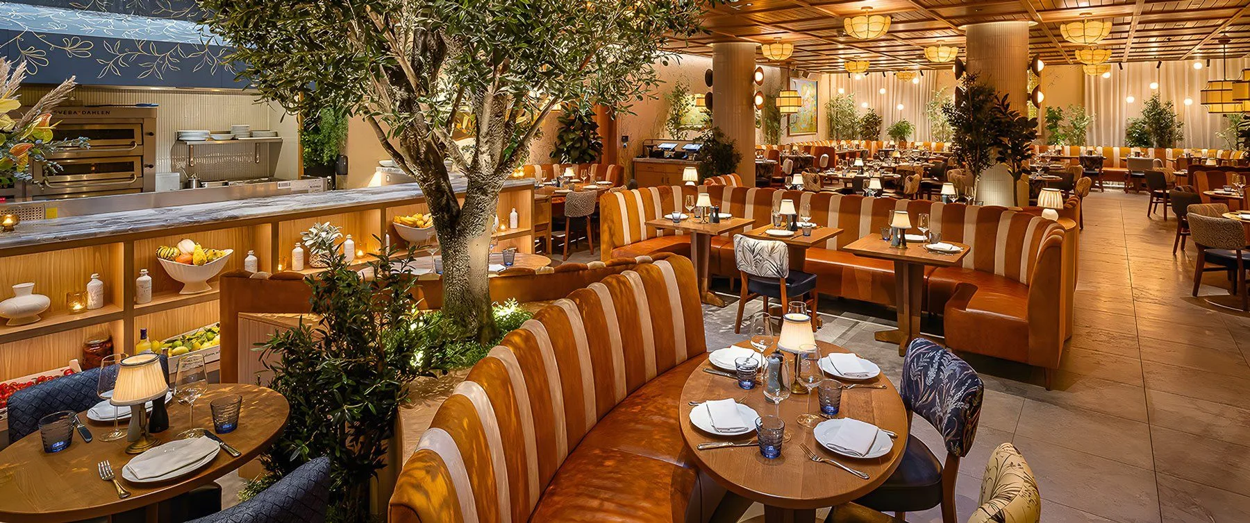 Light-filled ground floor dining room at LAVO London — bespoke banquette seating by Make Bespoke Studio