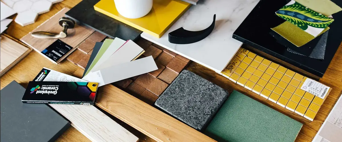 Finish samples of timber, granite, ceramic tiles and colour cards for bespoke furniture